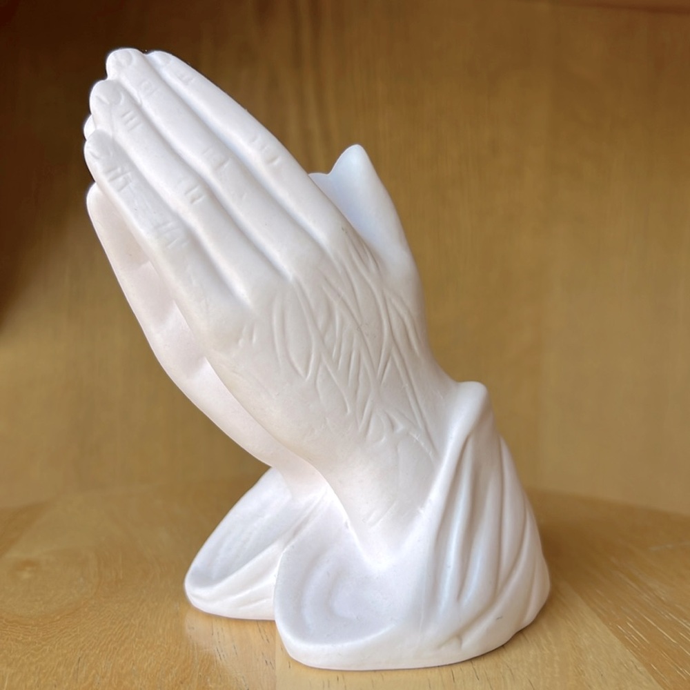 Ceramic praying hand figurine